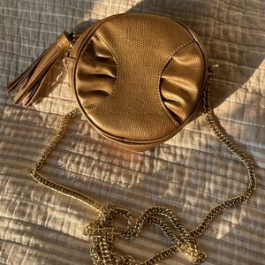 Liz Claiborne New York Textured Gold Round Crossbody Bag with Tassel Accent